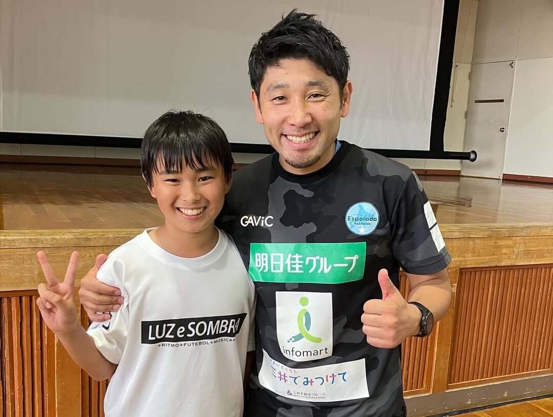 子どもとコーチ