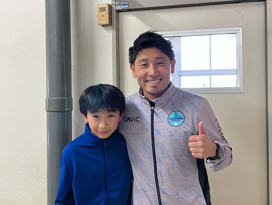 子どもとコーチ